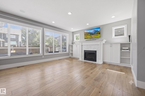1305 Hainstock Way Sw, Edmonton, AB - Indoor With Fireplace