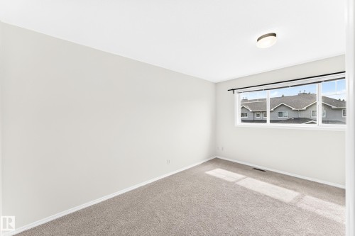 #93 230 Edwards Dr Sw, Edmonton, AB - Indoor Photo Showing Other Room