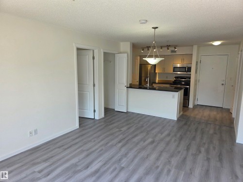 #309 5816 Mullen Pl Nw, Edmonton, AB - Indoor Photo Showing Kitchen