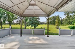 Expansive outdoor deck with composite wood-finish flooring - 