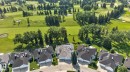 Aerial perspective showcasing properties bordering a golf course - 120 Ironwood Place Nw, Edmonton, AB  - Outdoor With View 