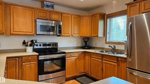 7 Andrew Drive, Rural Athabasca County, AB - Indoor Photo Showing Kitchen With Stainless Steel Kitchen With Double Sink