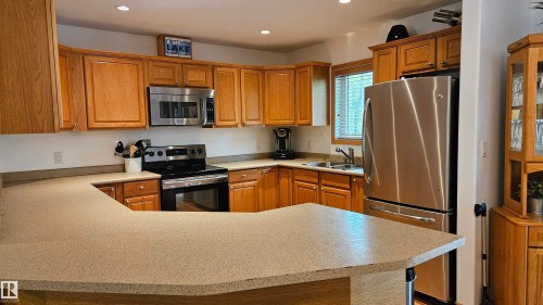 7 Andrew Drive, Rural Athabasca County, AB - Indoor Photo Showing Kitchen With Stainless Steel Kitchen With Double Sink