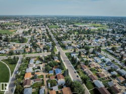 Expansive residential area featuring a grid street pattern and numerous individual homes - 