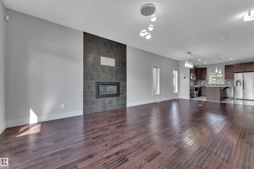 2604 20 Avenue Nw, Edmonton, AB - Indoor Photo Showing Living Room With Fireplace