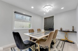 Recessed ceiling lighting complements a contemporary chandelier - 
