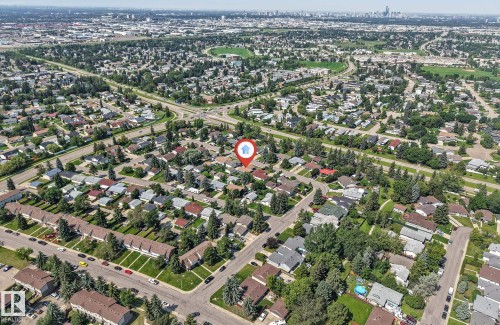 Established neighborhood setting with mature trees and residential properties - 7419 33 Avenue Nw, Edmonton, AB - Outdoor With View