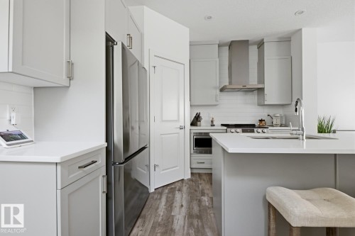 #19 5122 213A St Nw, Edmonton, AB - Indoor Photo Showing Kitchen With Double Sink With Upgraded Kitchen