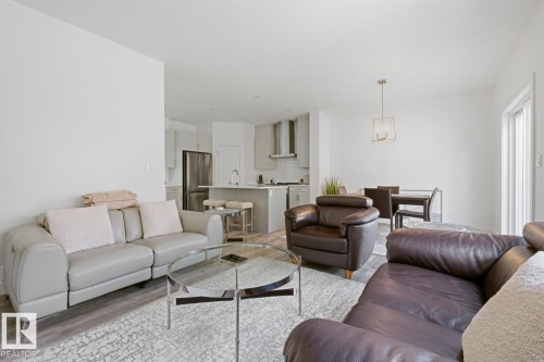 #19 5122 213A St Nw, Edmonton, AB - Indoor Photo Showing Living Room