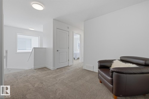#19 5122 213A St Nw, Edmonton, AB - Indoor Photo Showing Other Room