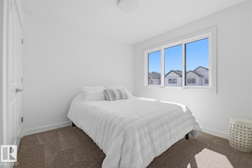 #19 5122 213A St Nw, Edmonton, AB - Indoor Photo Showing Bedroom