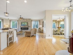 Hardwood flooring throughout living areas - 