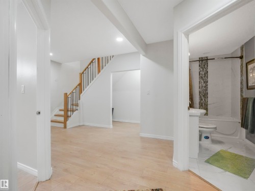 Open concept space featuring light wood-finish flooring - 16 Crystal Keys Crescent, Rural Wetaskiwin County, AB - Indoor Photo Showing Other Room