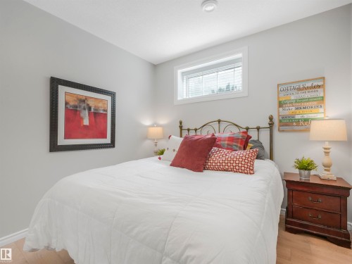 Recessed ceiling lighting, light wood-finish flooring, and a window with blinds - 16 Crystal Keys Crescent, Rural Wetaskiwin County, AB - Indoor Photo Showing Bedroom