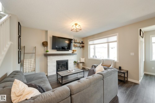 25 Daly Place, Fort Saskatchewan, AB - Indoor Photo Showing Living Room With Fireplace