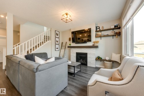 25 Daly Place, Fort Saskatchewan, AB - Indoor Photo Showing Living Room With Fireplace