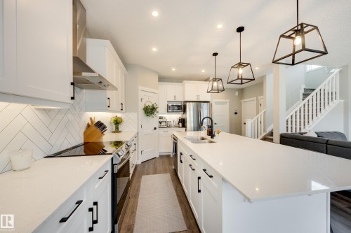 25 Daly Place, Fort Saskatchewan, AB - Indoor Photo Showing Kitchen With Double Sink With Upgraded Kitchen