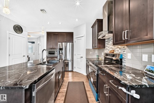 6122 175A Avenue Nw, Edmonton, AB - Indoor Photo Showing Kitchen With Stainless Steel Kitchen With Double Sink With Upgraded Kitchen