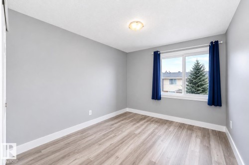 167 Roseland Village Nw, Edmonton, AB - Indoor Photo Showing Other Room