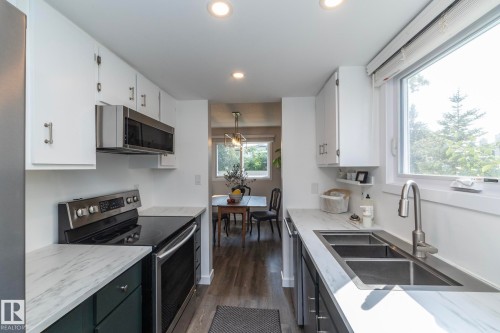 10552 Beaumaris Road Nw, Edmonton, AB - Indoor Photo Showing Kitchen With Double Sink