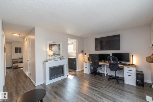 10552 Beaumaris Road Nw, Edmonton, AB - Indoor With Fireplace
