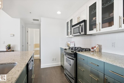 #506 10028 119 St Nw, Edmonton, AB - Indoor Photo Showing Kitchen With Upgraded Kitchen