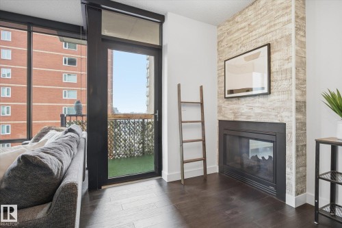 #506 10028 119 St Nw, Edmonton, AB - Indoor With Fireplace