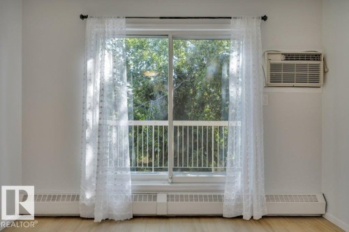 #404 17511 98A Av Nw, Edmonton, AB - Indoor Photo Showing Other Room