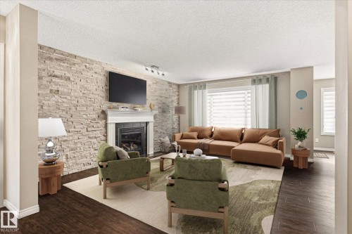 757 173B Street Sw, Edmonton, AB - Indoor Photo Showing Living Room With Fireplace