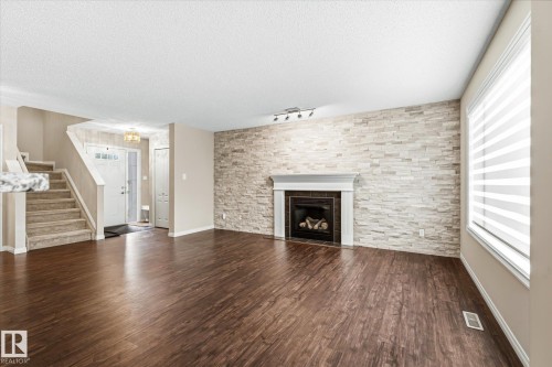 757 173B Street Sw, Edmonton, AB - Indoor Photo Showing Living Room With Fireplace
