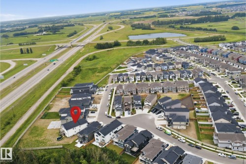 Aerial perspective highlighting a residential community with contemporary homes - 304 33 Avenue Nw, Edmonton, AB - Outdoor With View