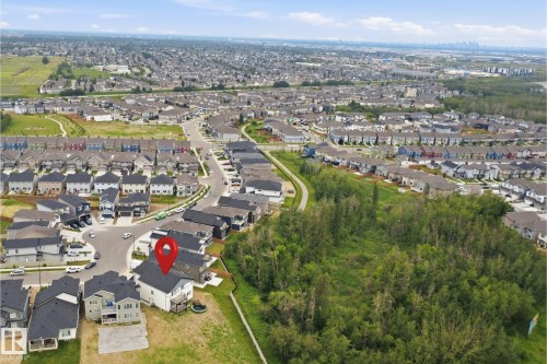Aerial overview of a residential neighborhood with varied housing styles - 304 33 Avenue Nw, Edmonton, AB - Outdoor With View