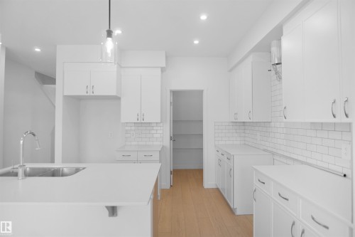 8707 183 Avenue Nw, Edmonton, AB - Indoor Photo Showing Kitchen With Double Sink With Upgraded Kitchen