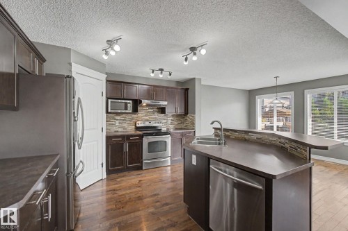 5 Cypress Link, Fort Saskatchewan, AB - Indoor Photo Showing Kitchen With Stainless Steel Kitchen With Double Sink With Upgraded Kitchen