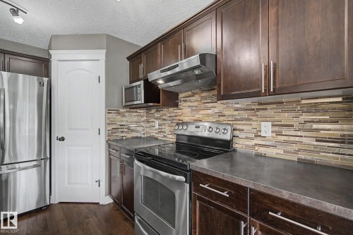 5 Cypress Link, Fort Saskatchewan, AB - Indoor Photo Showing Kitchen With Stainless Steel Kitchen With Upgraded Kitchen