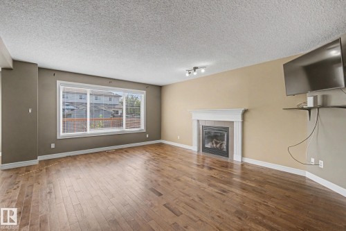 5 Cypress Link, Fort Saskatchewan, AB - Indoor Photo Showing Living Room With Fireplace