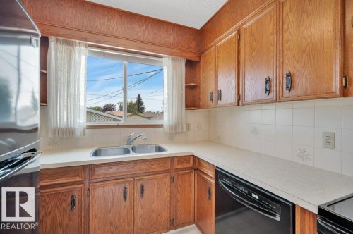 8507 70 Street Nw, Edmonton, AB - Indoor Photo Showing Kitchen With Double Sink