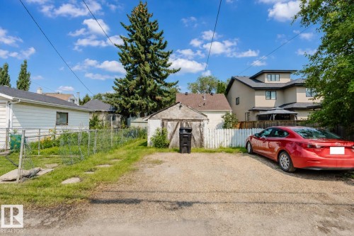 Gravel parking area featuring an existing storage shed - 10955 72 Avenue Nw, Edmonton, AB - Outdoor