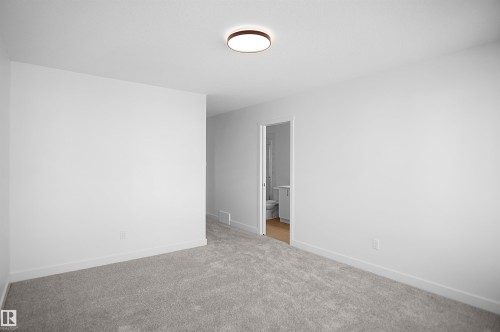 58 Lemon Close, Spruce Grove, AB - Indoor Photo Showing Other Room