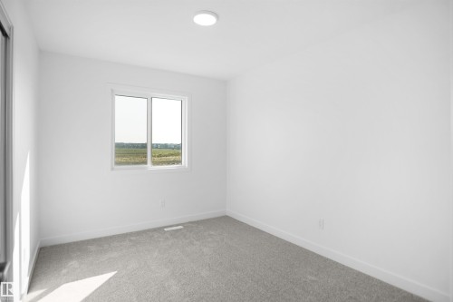 58 Lemon Close, Spruce Grove, AB - Indoor Photo Showing Other Room
