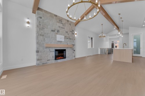 264 Falcon Crescent, Leduc, AB - Indoor Photo Showing Other Room With Fireplace