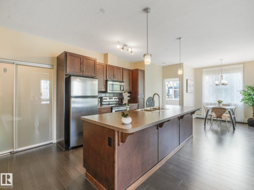 #346 308 Ambleside Li Sw, Edmonton, AB - Indoor Photo Showing Kitchen With Double Sink