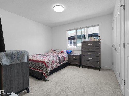 #7 7110 Keswick Common Sw, Edmonton, AB - Indoor Photo Showing Bedroom