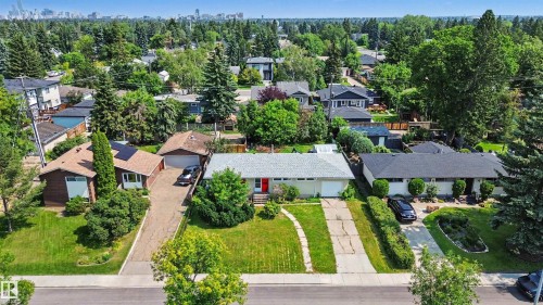 Aerial perspective showcasing a residential street lined with mature trees - 8215 149 Street Nw, Edmonton, AB - Outdoor