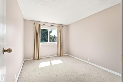 Neutral-toned walls and plush carpeting characterize this room - 281 Vantage Lane, Sherwood Park, AB - Indoor Photo Showing Other Room
