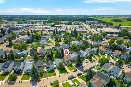 Aerial perspective showcasing the residential neighborhood with commercial areas in the background - 281 Vantage Lane, Sherwood Park, AB - Outdoor With View