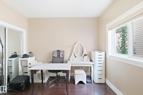 Room featuring wood-finish flooring, neutral wall tones, and white trim - 5931 12 Avenue Sw, Edmonton, AB - Indoor Photo Showing Office
