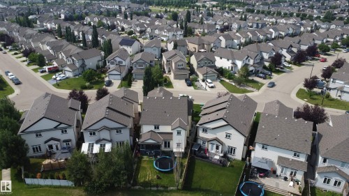 Residential neighborhood featuring a grid of paved streets and numerous detached homes with shingled roofs - 5931 12 Avenue Sw, Edmonton, AB - Outdoor With View