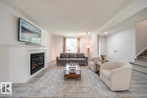 10519 140 Street Nw, Edmonton, AB - Indoor Photo Showing Living Room With Fireplace