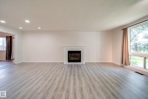 10519 140 Street Nw, Edmonton, AB - Indoor Photo Showing Living Room With Fireplace